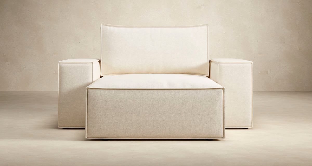 Newilla Lounger Chair with Wide Arms by Innovation, showing front view of newilla lounger chair with wide arms.