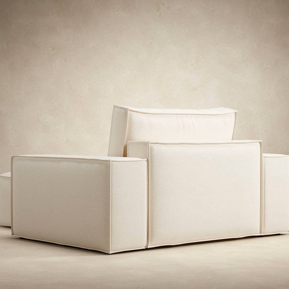 Newilla Lounger Chair with Wide Arms by Innovation, showing back view of newilla lounger chair with wide arms.