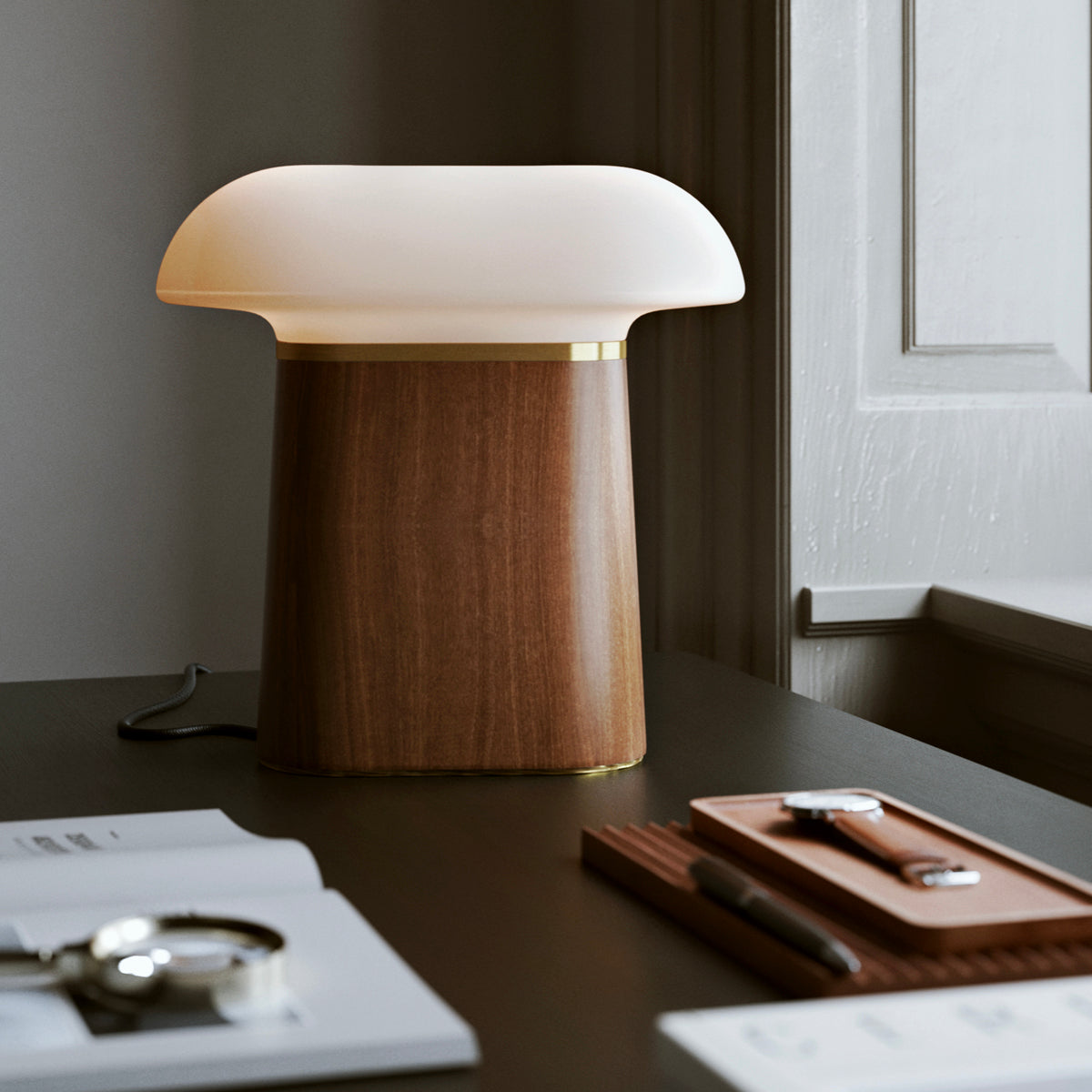Nova Table Lamp by Woud, showing nova table lamp in live shot.
