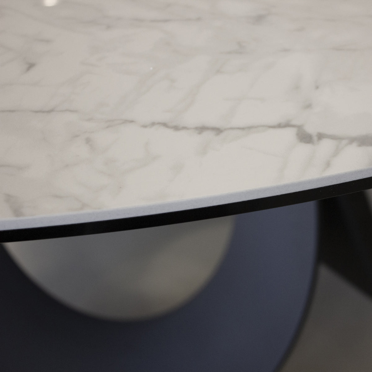 Optic Round Dining Table by Mobital, showing closeup view of optic round dining table.