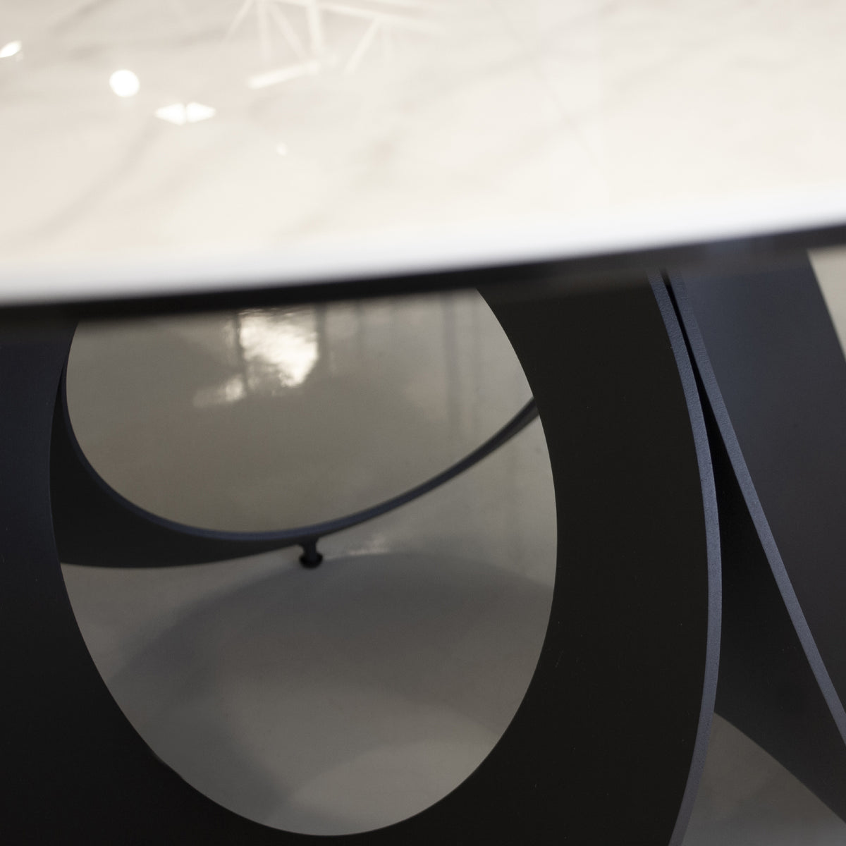 Optic Round Dining Table by Mobital, showing closeup view of optic round dining table.