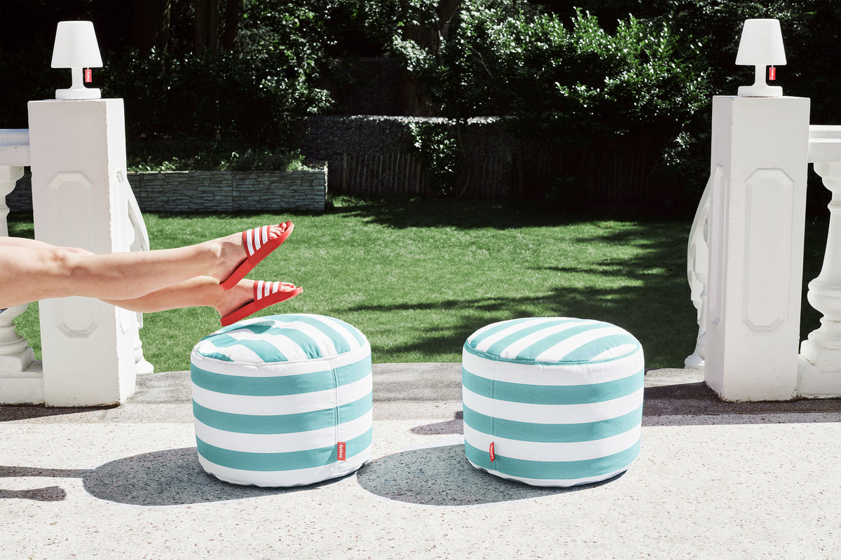 Point Outdoor Pouf/Ottoman by Fatboy, showing point outdoor pouf/ottoman in live shot.