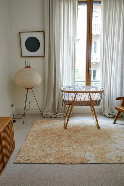 Planet Bee Washable Rug by Lorena Canals, showing planet bee washable rug in live shot.