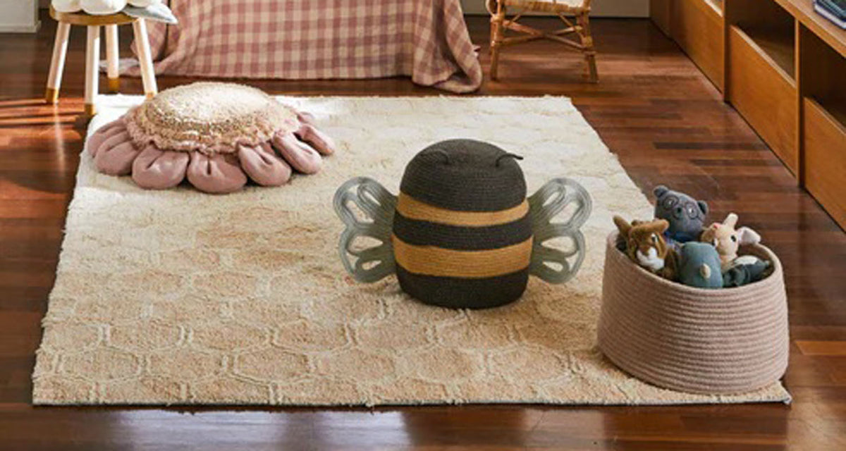 Planet Bee Washable Rug by Lorena Canals, showing planet bee washable rug in live shot.