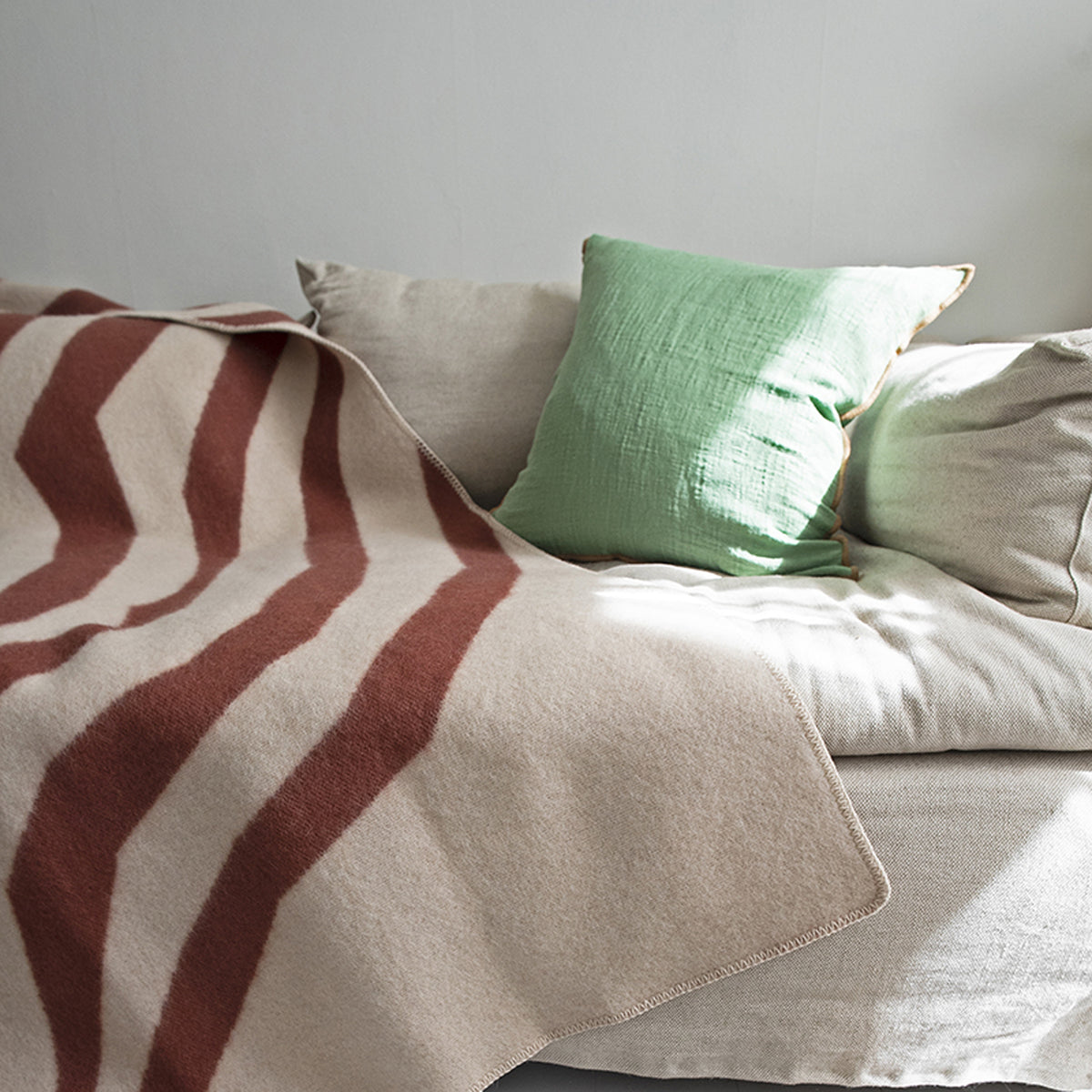Pugh Wool Blanket by Brita, showing pugh wool blanket in live shot.