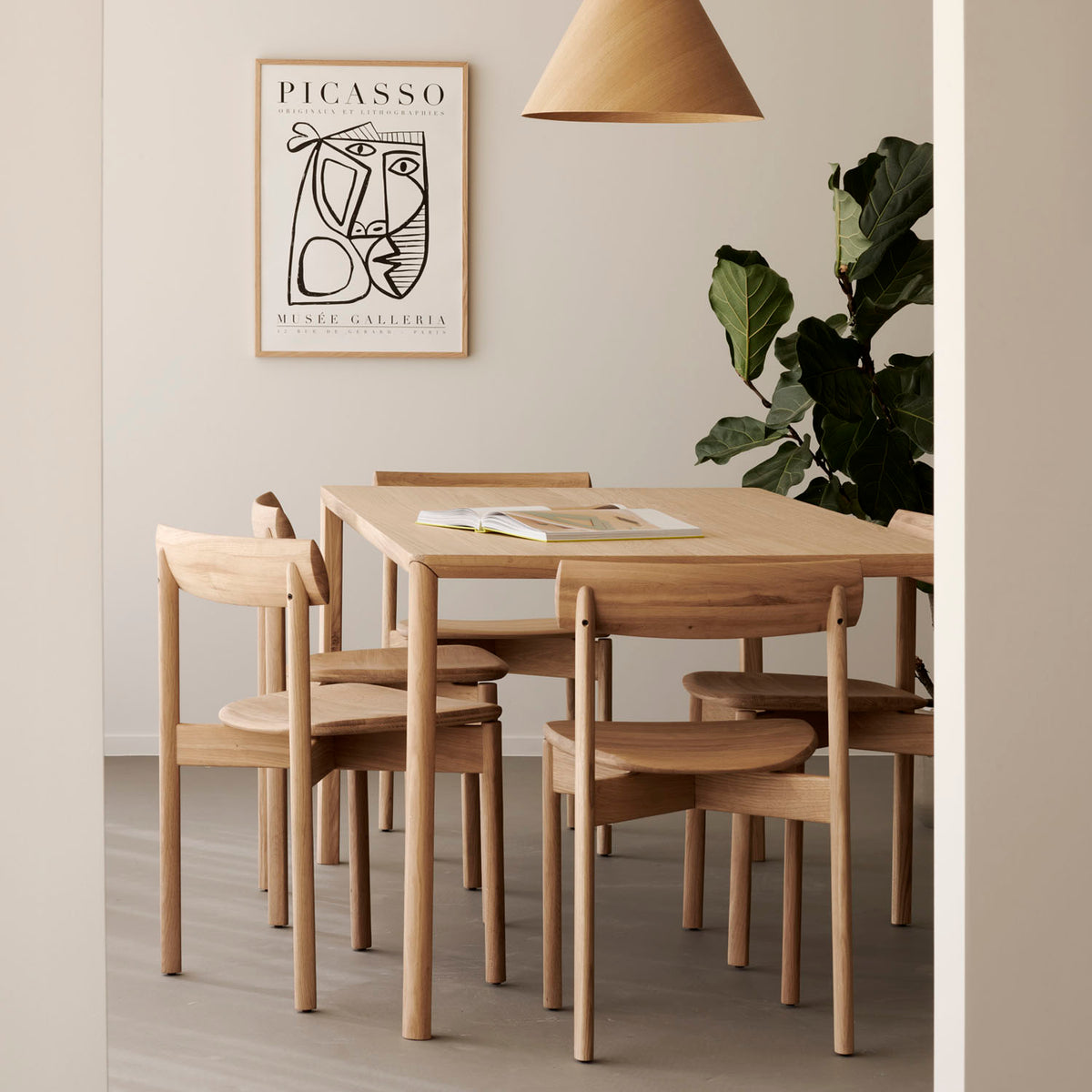 Risu Dining Chair by Ethnicraft, showing risu dining chair in live shot.