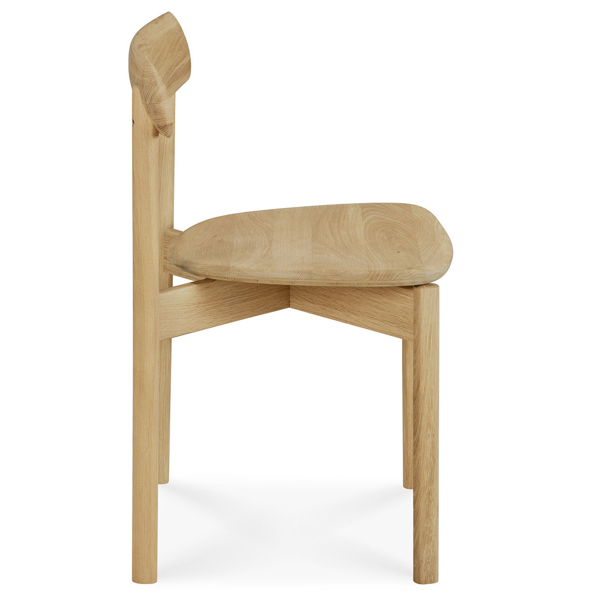 Risu Dining Chair by Ethnicraft, showing side view of risu dining chair.