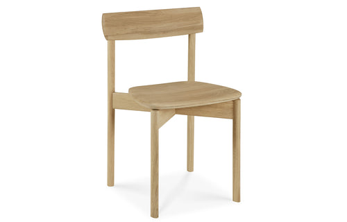 Risu Dining Chair by Ethnicraft, showing angle view of risu dining chair.