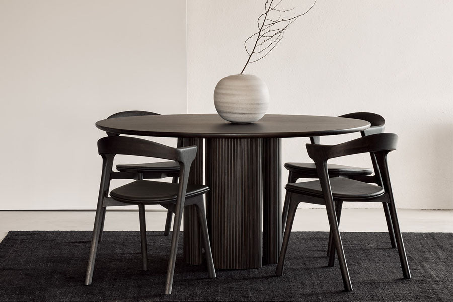 Roller Max Dining Table by Ethnicraft, showing roller max dining table in live shot.