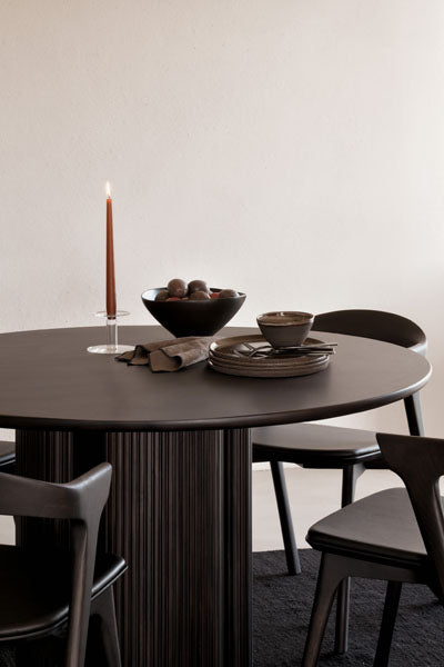 Roller Max Dining Table by Ethnicraft, showing roller max dining table in live shot.