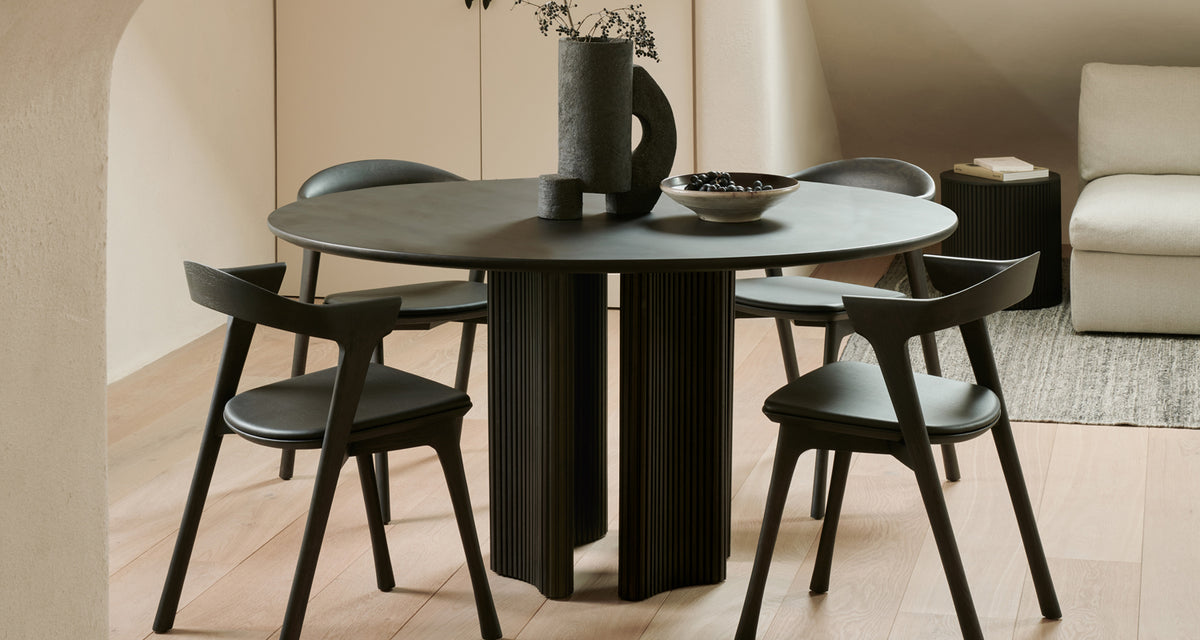 Roller Max Dining Table by Ethnicraft, showing roller max dining table in live shot.