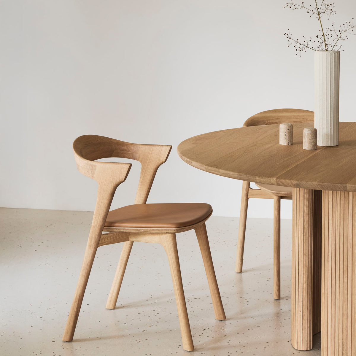 Roller Max Dining Table by Ethnicraft, showing roller max dining table in live shot.