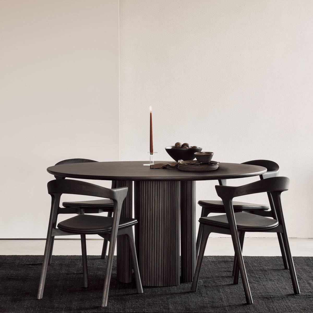 Roller Max Dining Table by Ethnicraft, showing roller max dining table in live shot.