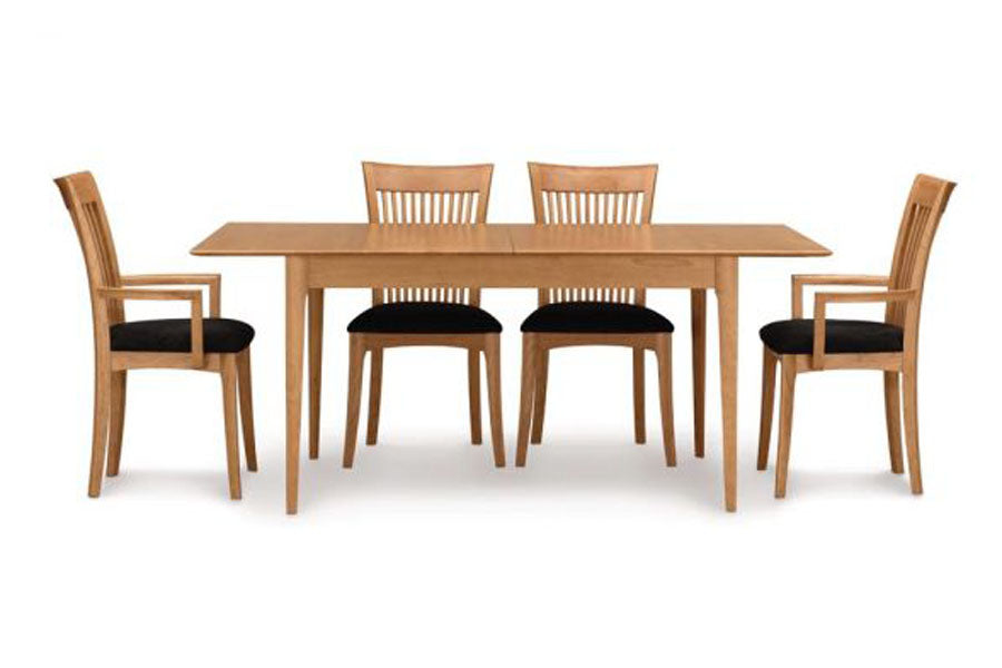 Sarah Trestle Extension Table with easystow extension and leaf storage by Copeland Furniture, showing sarah trestle extension table with easystow extension and leaf storage with chairs.