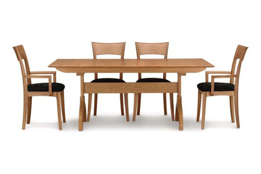 Sarah Trestle Extension Table with easystow extension and leaf storage by Copeland Furniture, showing sarah trestle extension table with easystow extension and leaf storage with chairs.