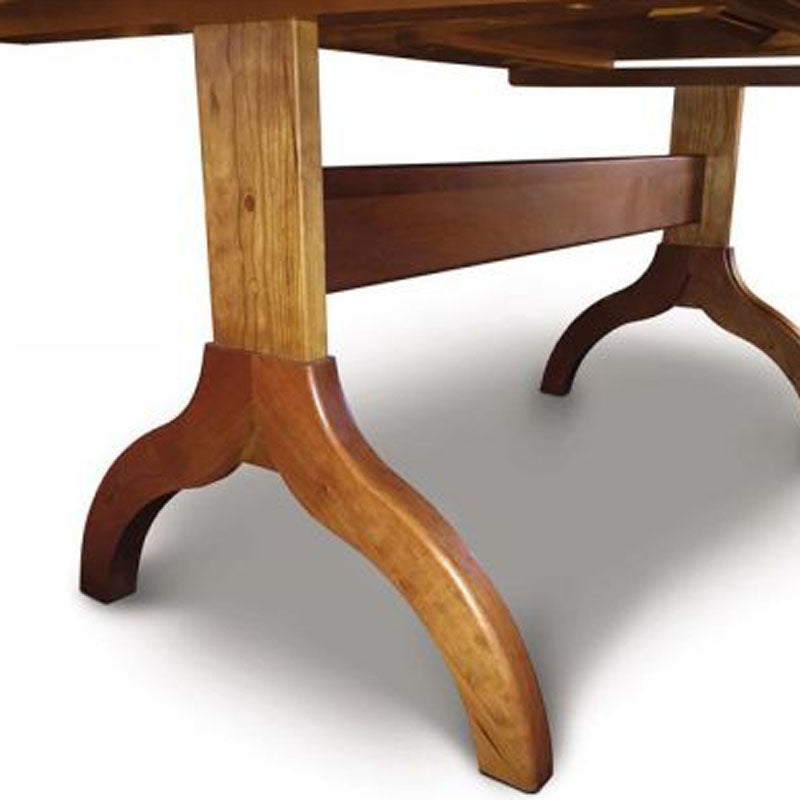Sarah Trestle Extension Table with easystow extension and leaf storage by Copeland Furniture, showing closeup view of sarah trestle extension table with easystow extension and leaf storage.