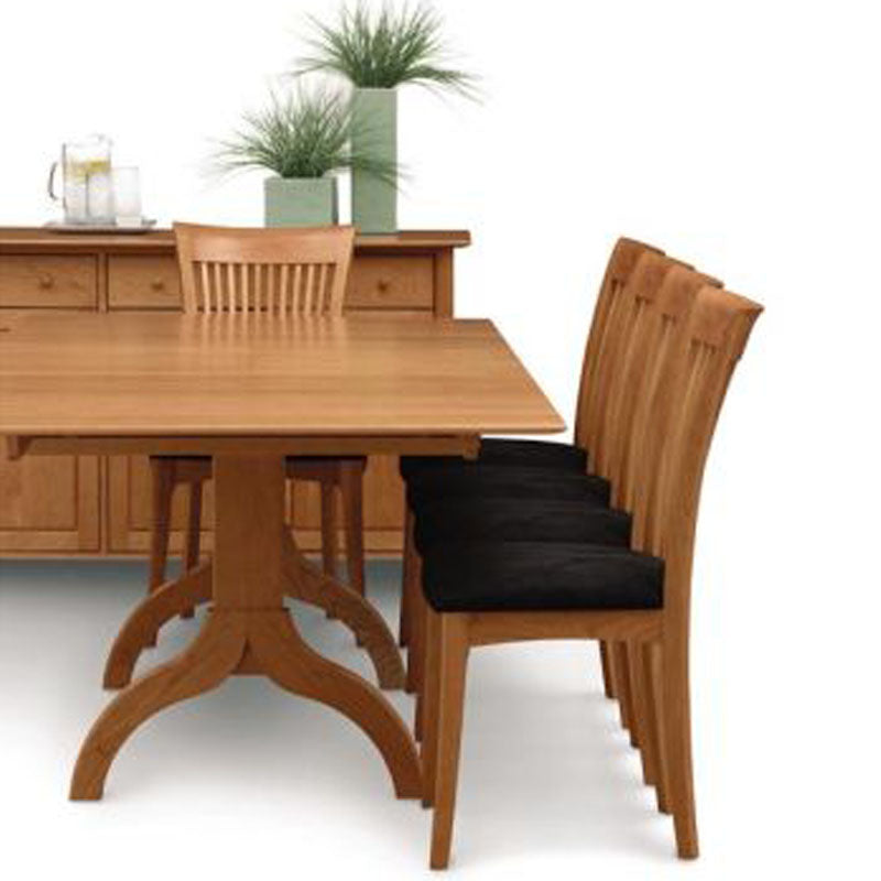 Sarah Trestle Extension Table with easystow extension and leaf storage by Copeland Furniture, showing closeup view of sarah trestle extension table with easystow extension and leaf storage.