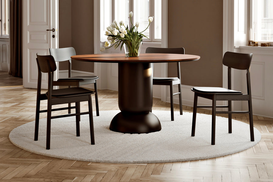 Soma Dining Chair by Woud, showing soma dining chair in live shot.