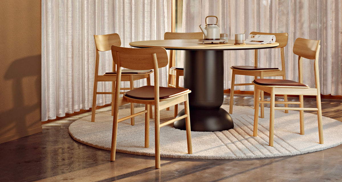 Soma Dining Chair by Woud, showing soma dining chair in live shot.