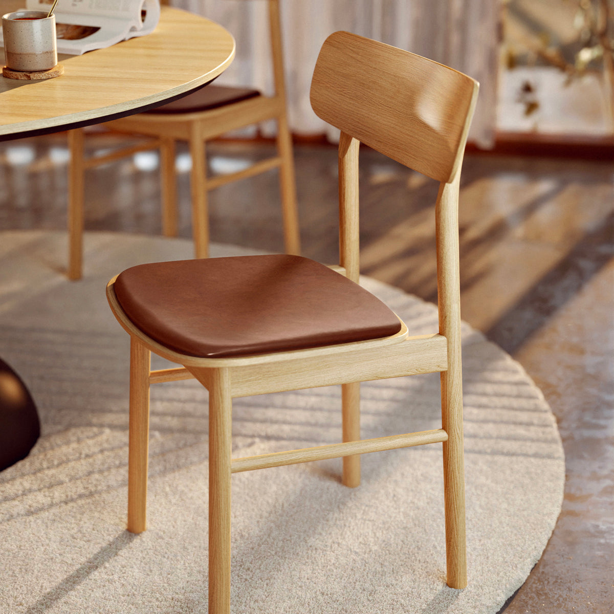 Soma Dining Chair by Woud, showing soma dining chair in live shot.