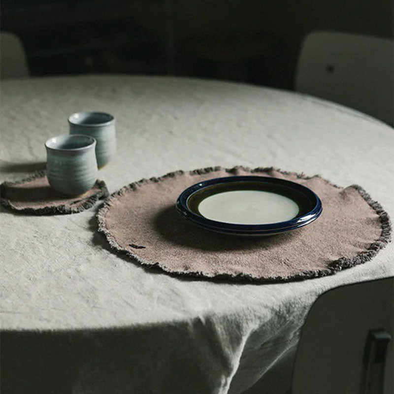 Stonewashed Placemats Set of 2  by Lorena Canals, showing stonewashed placemats set of 2 in live shot.