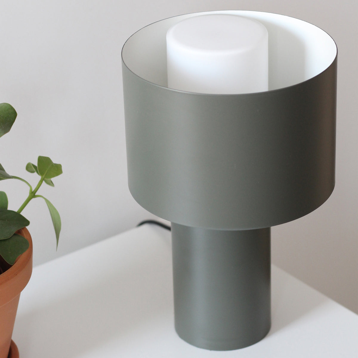 Tangent Table Lamp by Woud, showing tangent table lamp in live shot