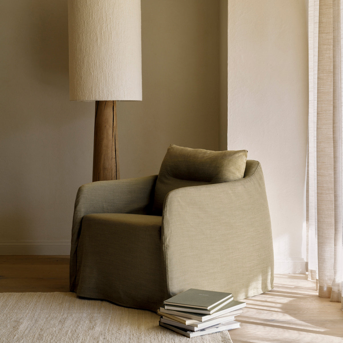 Weave Lounge Chair by Ethnicraft, showing weave lounge chair in live shot.