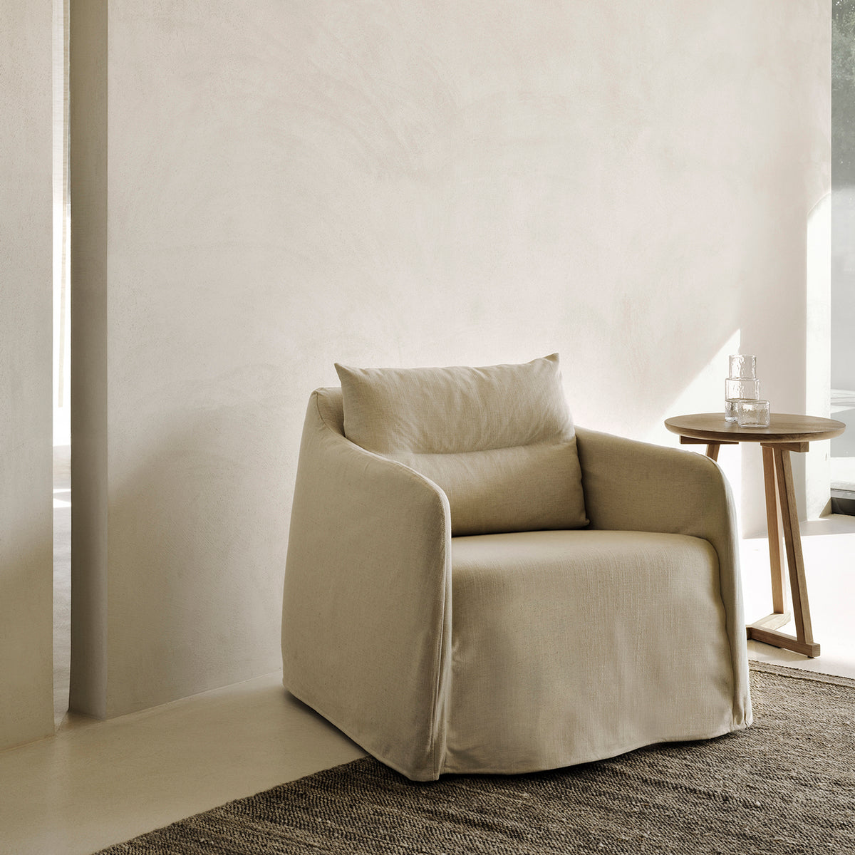 Weave Lounge Chair by Ethnicraft, showing weave lounge chair in live shot.