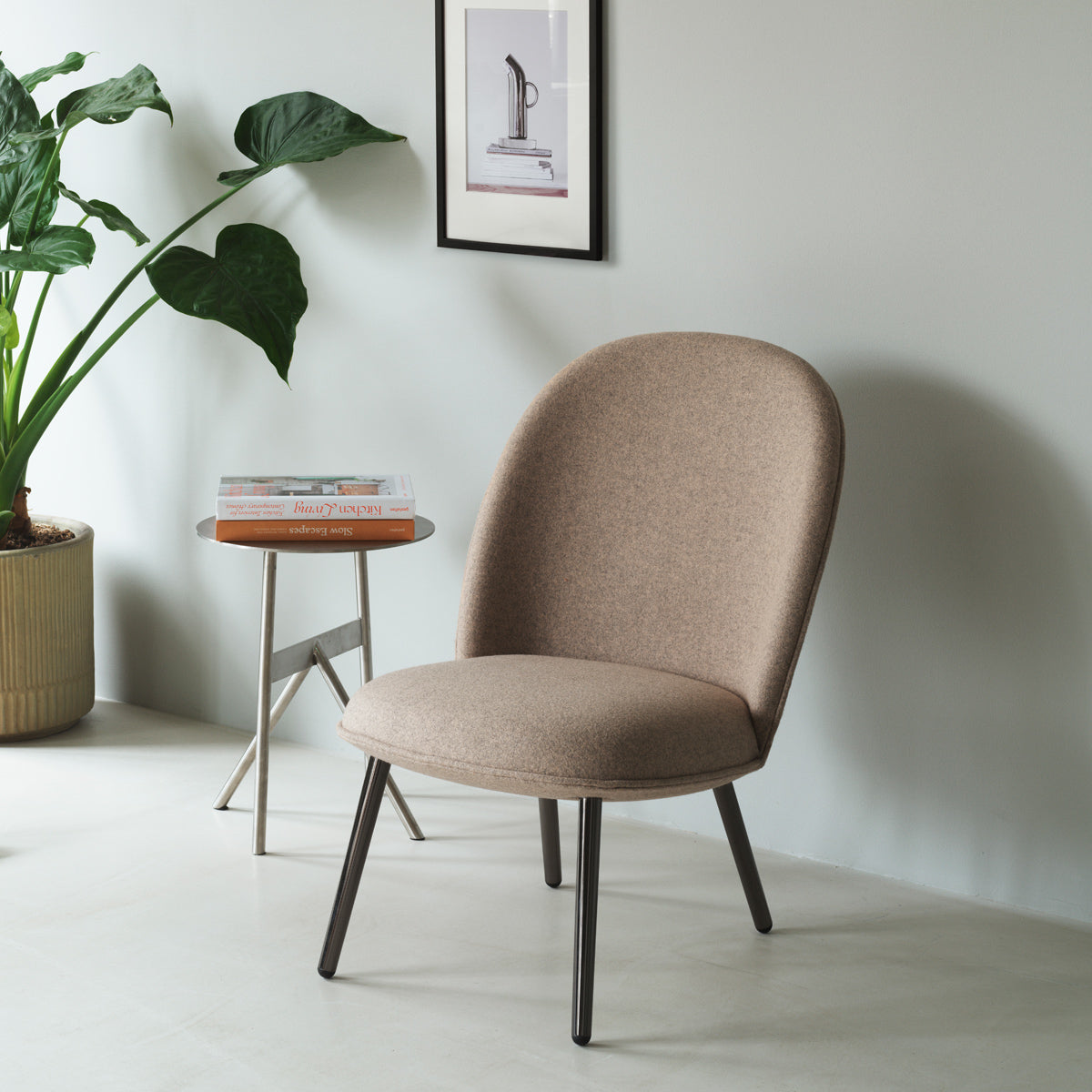 Ace Lounge Upholstery Chair by Normann Copenhagen, showing ace lounge upholstery chair in live shot.