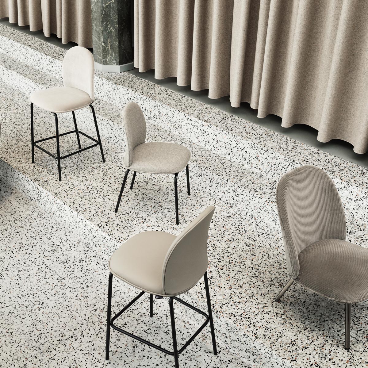 Ace Lounge Upholstery Chair by Normann Copenhagen, showing closeup view of ace lounge upholstery chair in live shot.