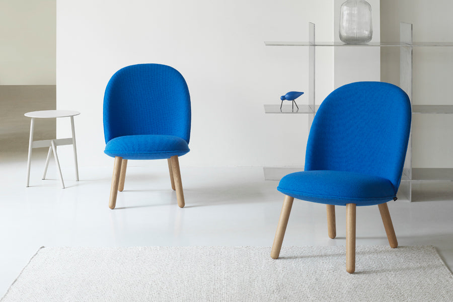 Ace Lounge Upholstery Chair by Normann Copenhagen, showing ace lounge upholstery chairs in live shot.