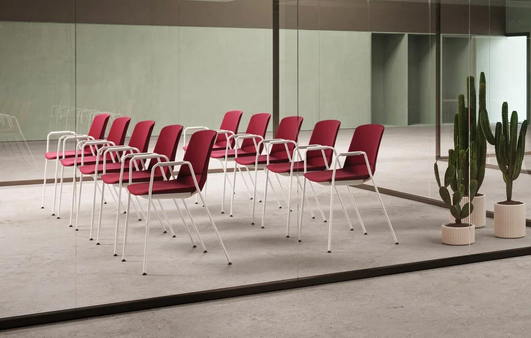 Adapta Stacking Armchair by Kollektiff, showing adapta stacking armchairs in live shot.