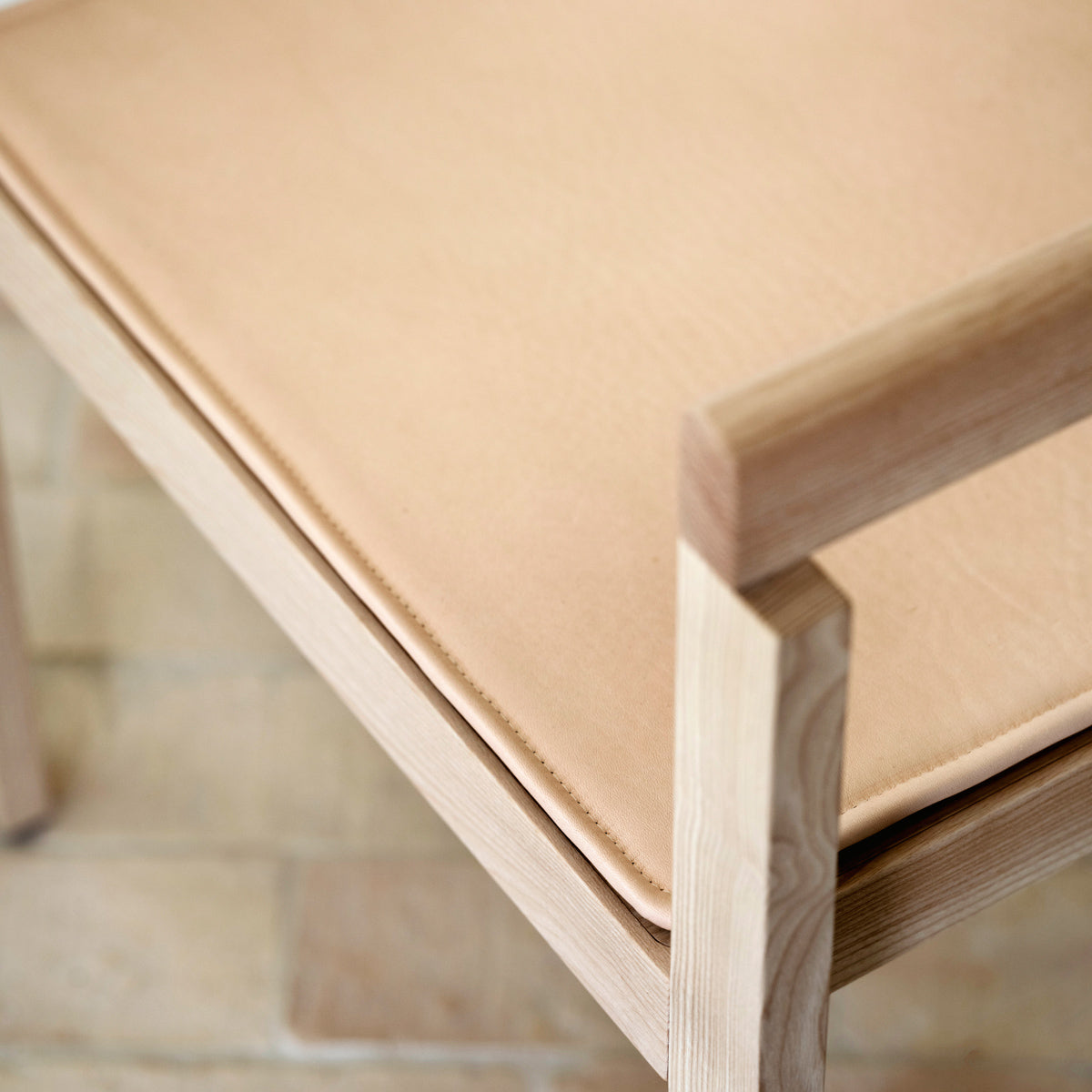 After Chair by Fritz Hansen, showing closeup view of after chair in live shot.