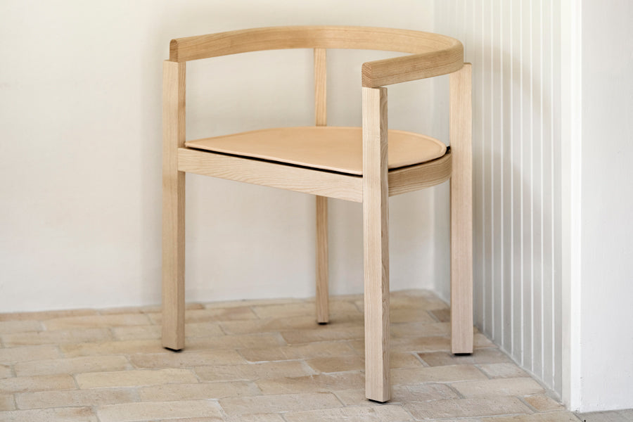 After Chair by Fritz Hansen, showing after chair in live shot.