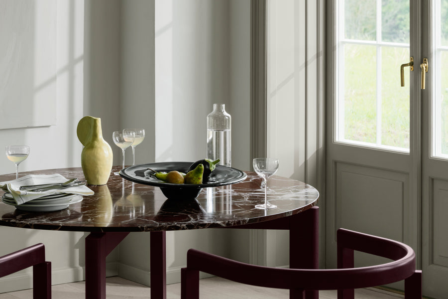After Chair by Fritz Hansen, showing closeup view of after chairs in live shot.