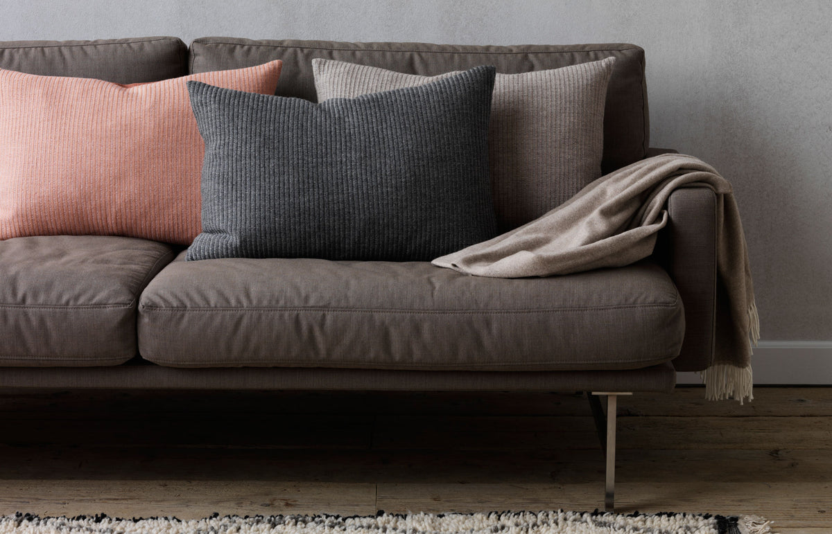 Aiayu Cushion by Fritz Hansen, showing aiayu cushions in live shot.
