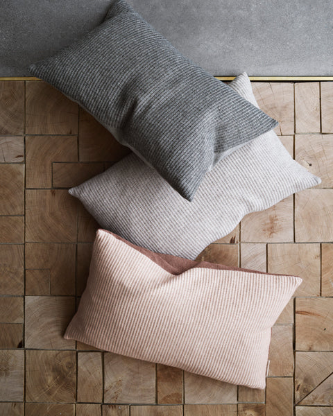 Aiayu Cushion by Fritz Hansen, showing aiayu cushions in live shot.