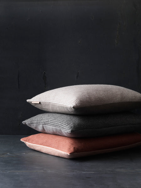 Aiayu Cushion by Fritz Hansen, showing aiayu cushions in live shot.