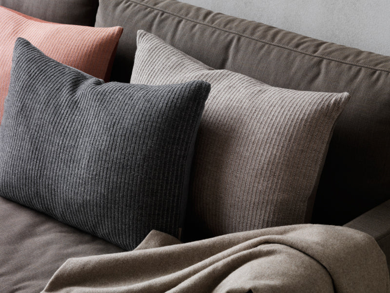 Aiayu Cushion by Fritz Hansen, showing aiayu cushions in live shot.