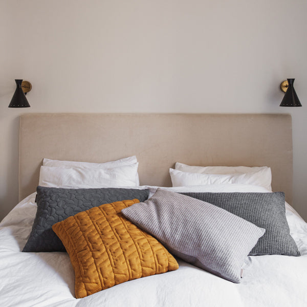 AJ Cushion by Fritz Hansen, showing aj cushions in live shot.