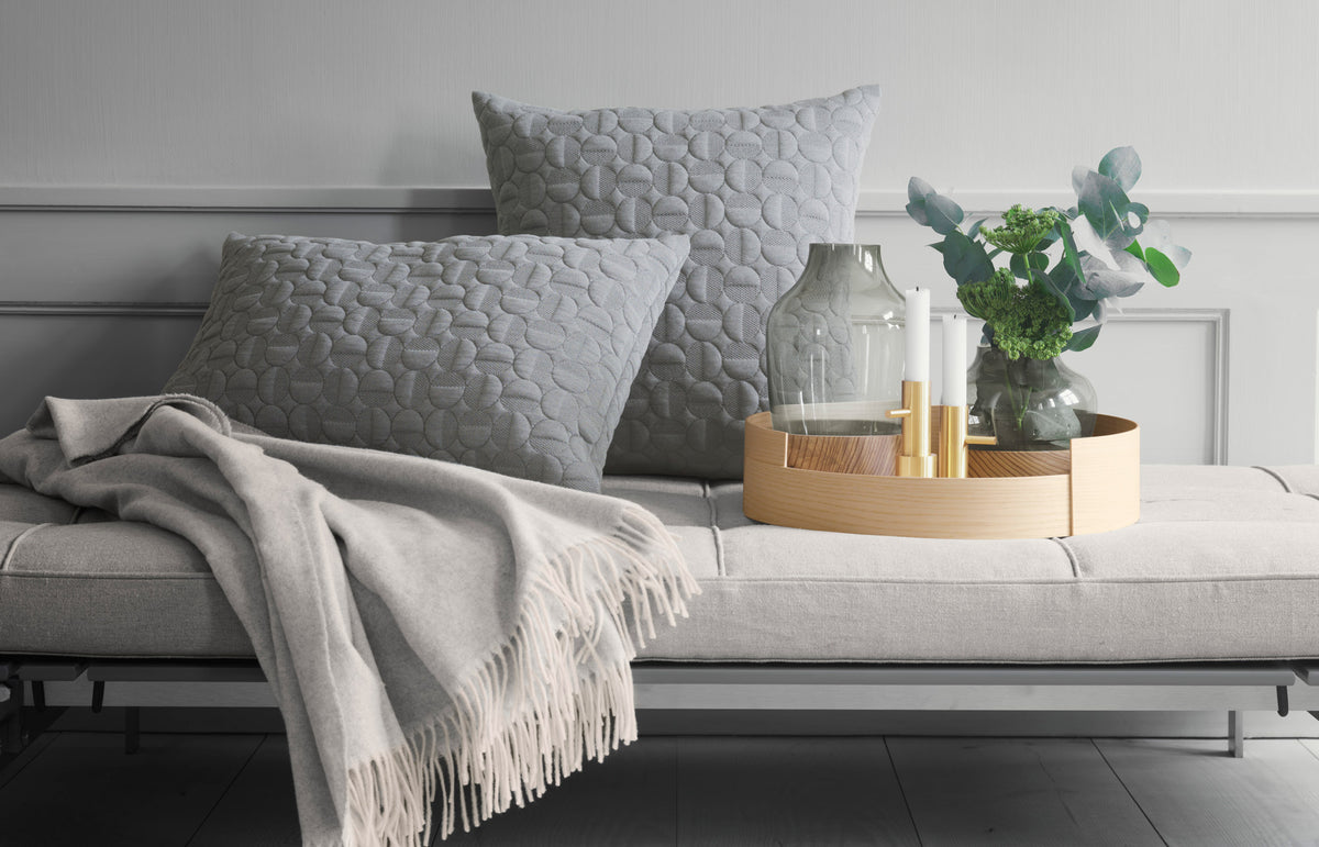 AJ Cushion by Fritz Hansen, showing aj cushions in live shot.