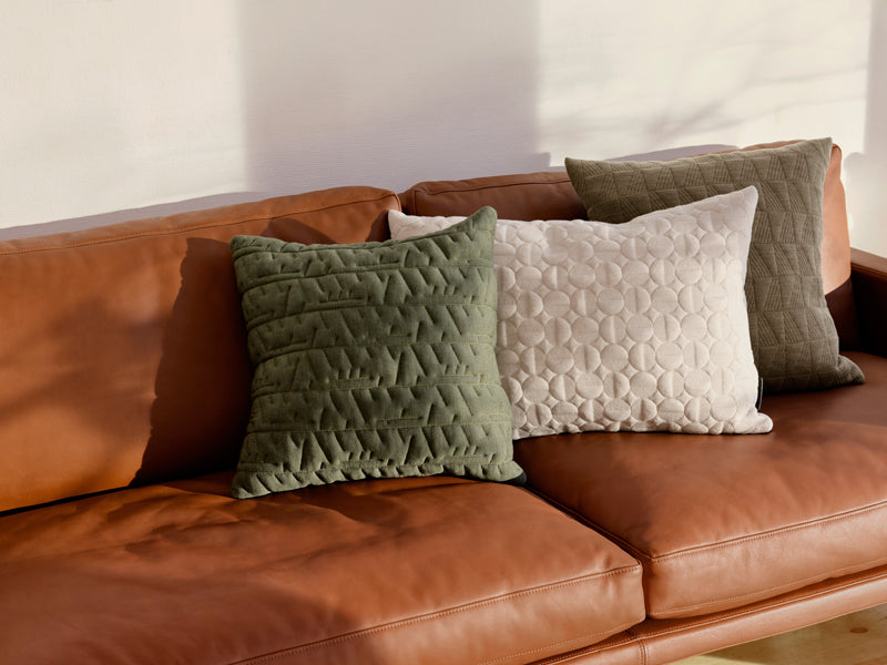 AJ Cushion by Fritz Hansen, showing aj cushions in live shot.
