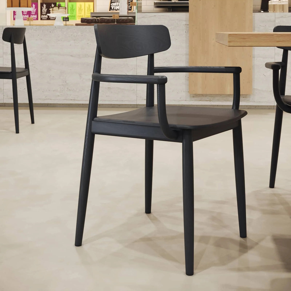 Alamosa Armchair by Kollektiff, showing alamosa armchairs in live shot.