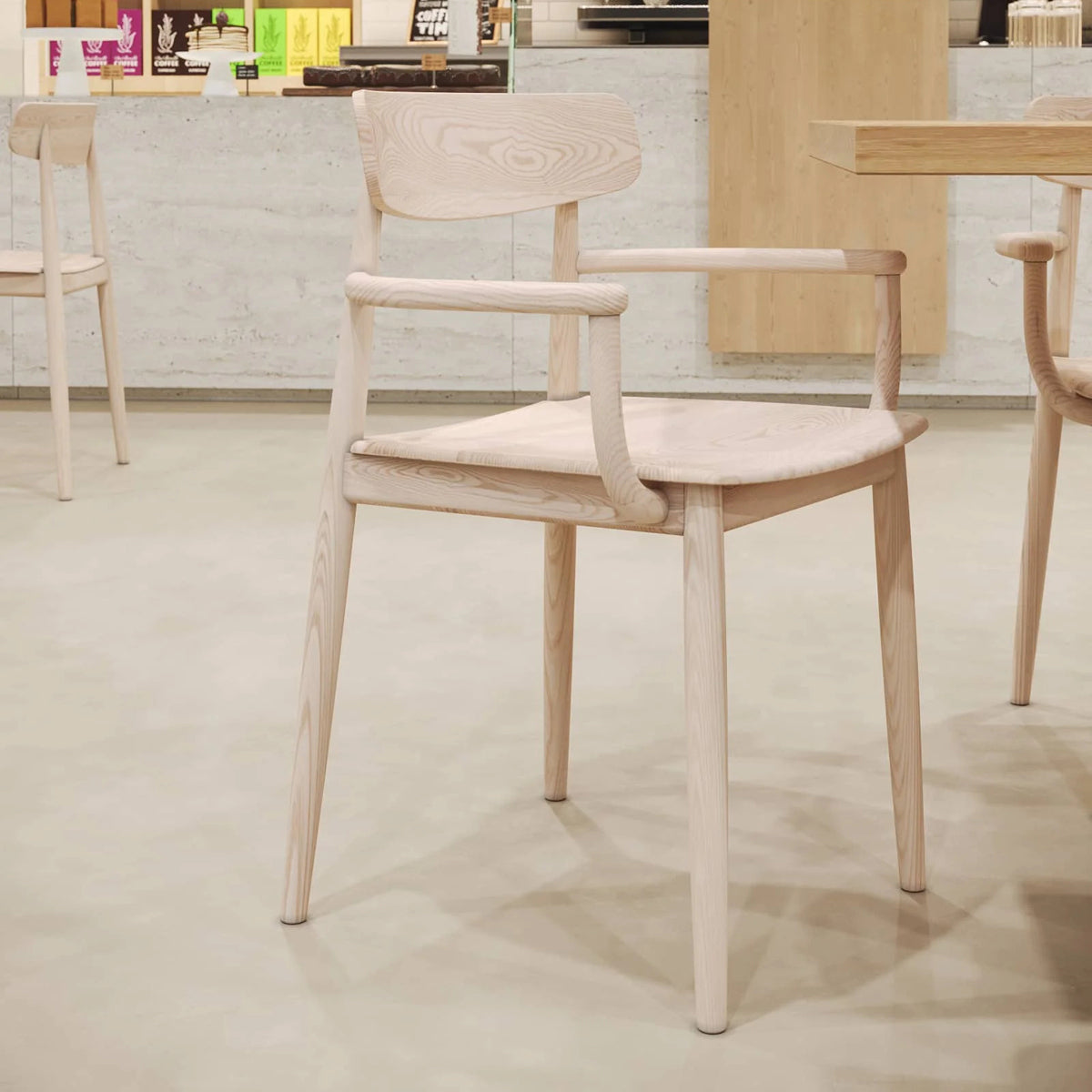 Alamosa Armchair by Kollektiff, showing alamosa armchairs in live shot.