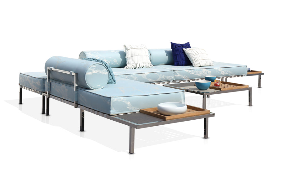 Albatross 316 Configurations 3 by Mamagreen, showing angle view of albatross 316 configurations 3 in heron white keops webbing/mixed/performance textiles (grade a)/mixed tray top with coffee table.