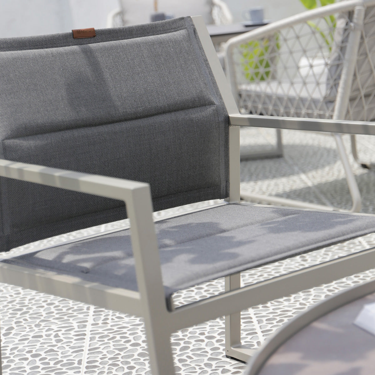 Allux Casual Chair (Padded Sling) by Mamagreen, showing closeup view of allux casual chair (padded sling) in live shot.