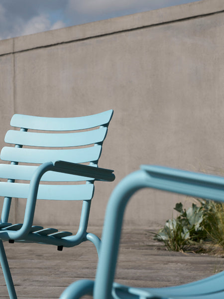 Alua Lounge Chair by Houe, showing closeup view of alua lounge chairs in live shot.