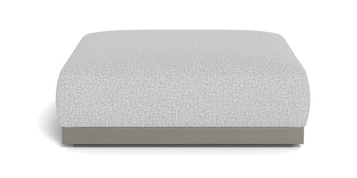 Amalfi Ottoman by Harbour, showing front view of amalfi ottoman in taupe aluminum/sand copacabana.