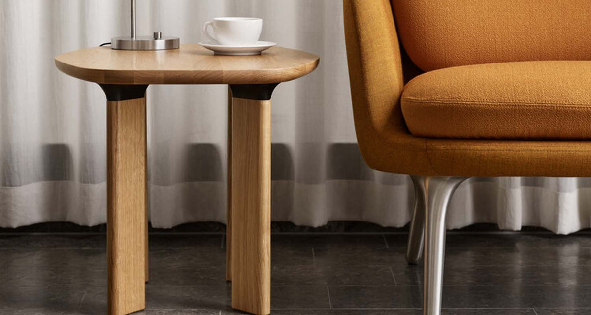 Analog Side Table by Fritz Hansen, showing analog side table in live shot.