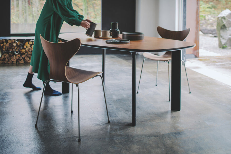 Analog Table by Fritz Hansen, showing analog table in live shot.